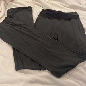 Size 6 lululemon flair leggings with cross hip. Gray and black